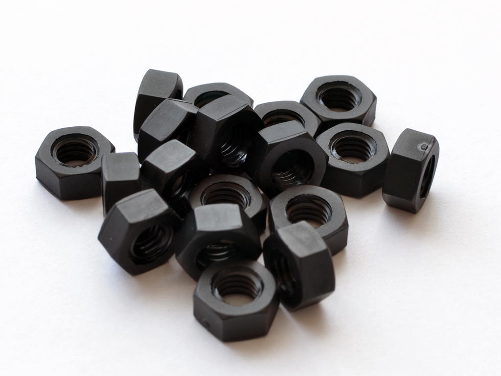

Nakrętka Nakrętki czarna plastikowa PA6 M4 10szt.