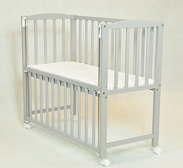 ŁÓŻECZKO DOSTAWKA OPUSZCZANY BOK KÓŁKA + MATERAC Marka Aruś