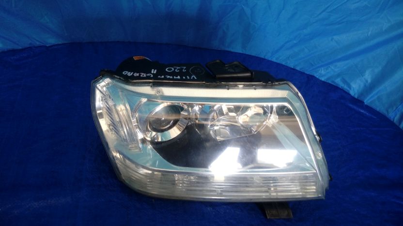 Lampa przednia Suzuki Grand Vitara II prawa 7398400947