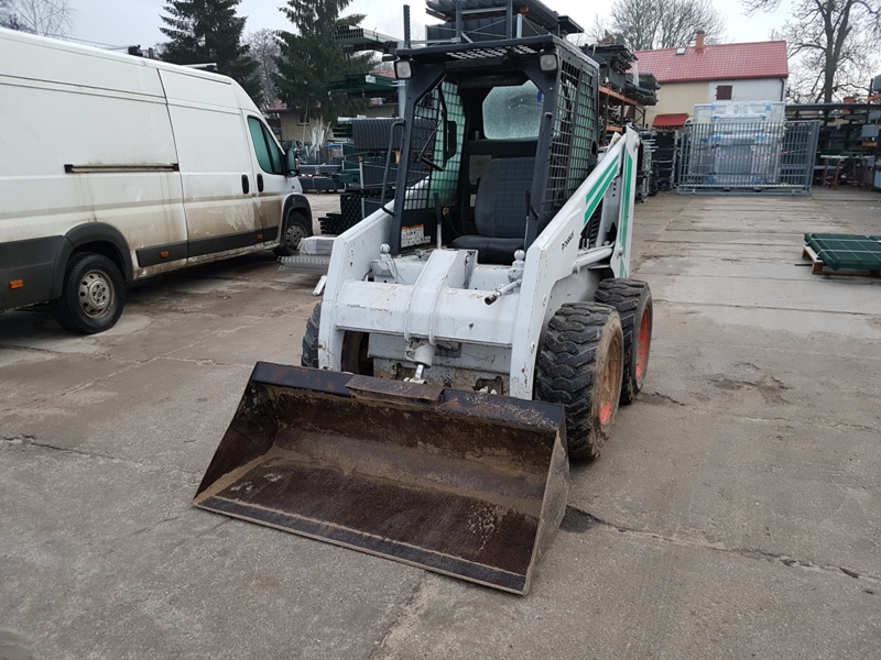 Mini ładowarka Bobcat 853, łyżka, widły