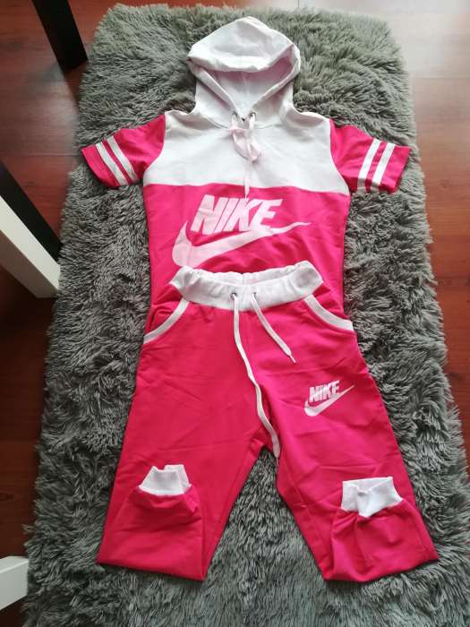 Dres damski Nike różowy rozmiar XS / S bluza i spo