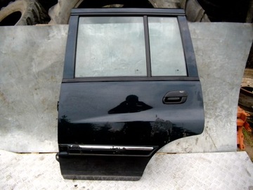 Ssangyong musso двері задні ліві зад фото №1