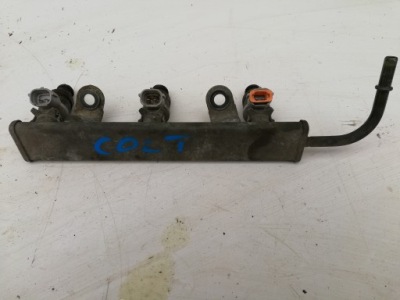 Mitsubishi colt 04-08 1.1b молдинг упорскування фото №1